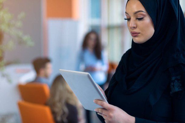 pretty modern Arabian woman with tablet computer - Foto, immagini