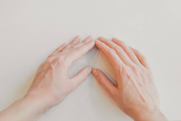 hands on white background. the concept of manifestation of emotions, gestures: heart - Photo, image