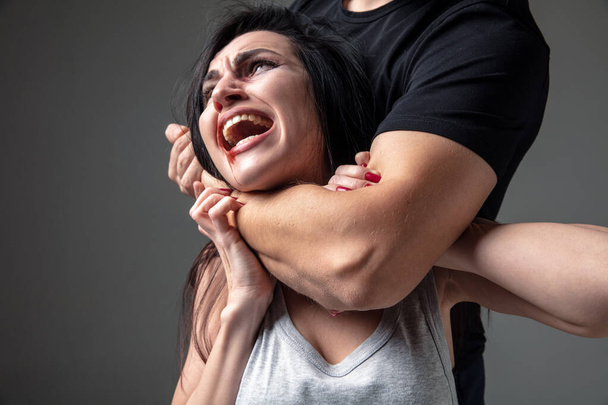 Woman being under domestic abuse and violence, concept of female rights - Foto, Imagem