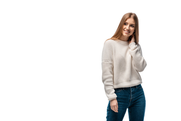 attractive happy in jeans and white sweater, isolated on white - Foto, Bild