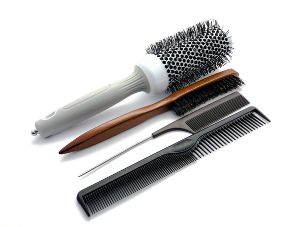 Composition of professional combs isolated on white background. Hairdressing tools. Combs. Composition for a beauty salon - Photo, Image