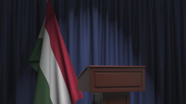 Macaristan bayrağı ve podyum tribünü. Siyasi olay veya açıklamayla ilgili kavramsal 3d canlandırması - Video, Çekim