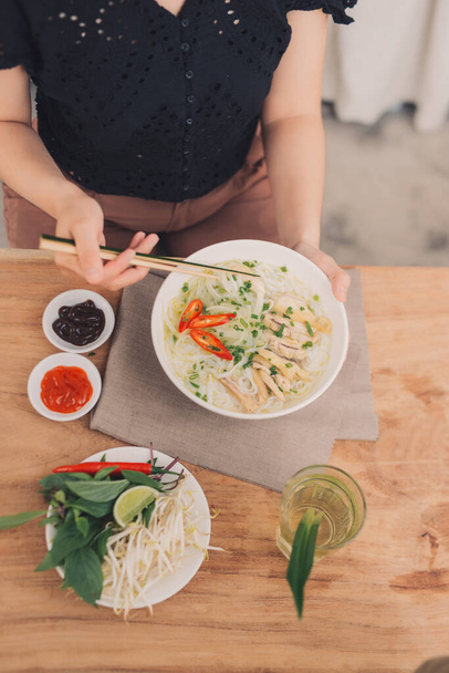 Asian dinner with vietnamese noodle soup pho bo, - Foto, Bild