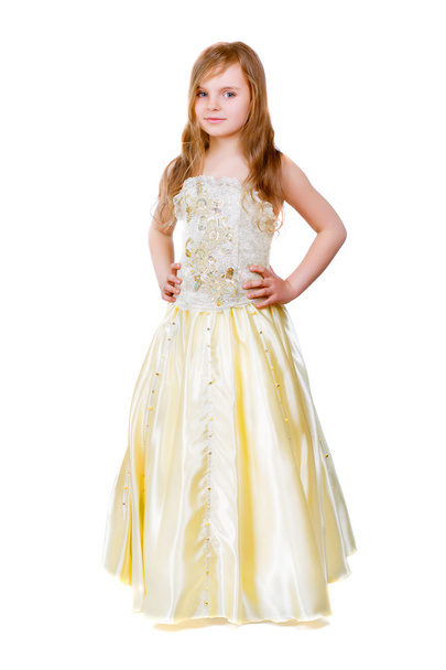 Little girl in golden dress - Foto, imagen