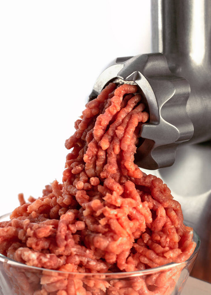 Preparation of fresh minced meat in a meat grinder at home. For cutlets and other dishes. - Photo, Image