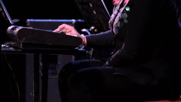 professional woman musician freckled hands play modern black electric piano. - Footage, Video