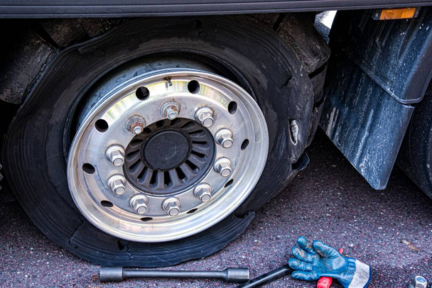 Truck wheel. Repair of cars on the road. Change wheel - Photo, Image