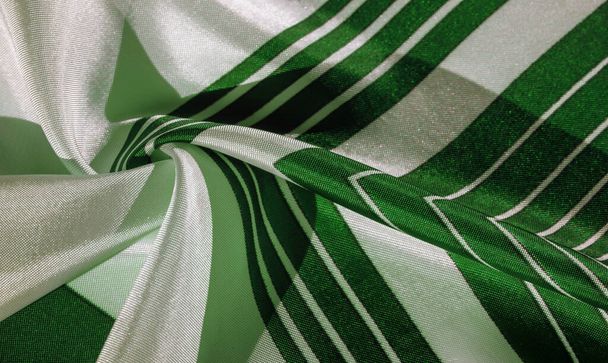 Texture,  silk fabric with a green striped pattern. The design o - Photo, Image