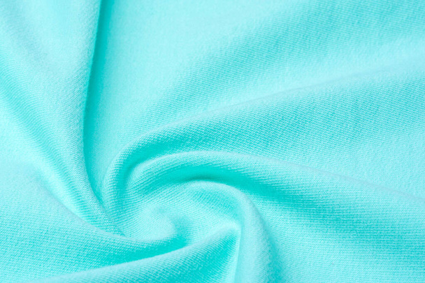 Texture, fond, motif. Le tissu est tricoté bleu, turquo
 - Photo, image