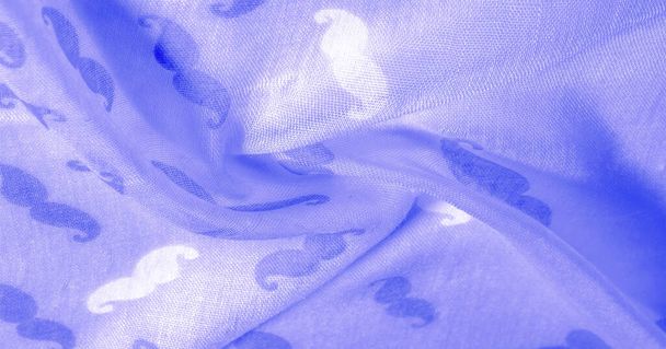 Φόντο υφής, μπλε μετάξι ύφασμα με ζωγραφισμένα κινούμενα σχέδια - Φωτογραφία, εικόνα