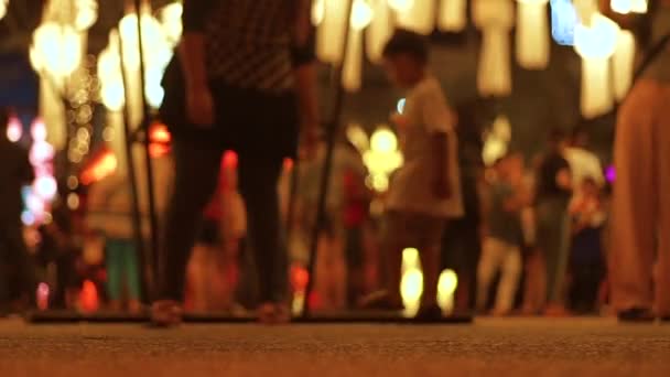 blur road/street in Chingmai Thailand by night with bokeh of Night market. - Footage, Video
