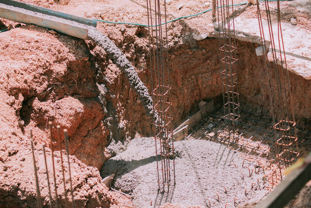 Placing concrete for the footing - Photo, Image