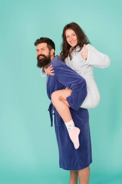 Loving people. family day. happy family enjoy weekend. leisure time together. having fun at home. good morning to you. man hipster play with woman in bathrobe. couple in love. love is in the air - Photo, Image