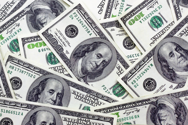 Αμερικάνικα χαρτονομίσματα των 100 δολαρίων ως ιστορικό χρημάτων. Επιχειρηματική έννοια. - Φωτογραφία, εικόνα