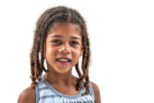 little girl doing facial expressions face on white background - Fotó, kép