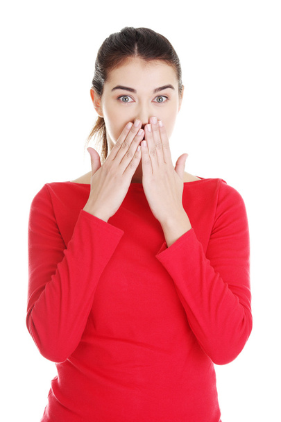 Femme choquée couvrant sa bouche avec des mains
 - Photo, image