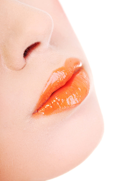 Beautiful glossy, orange woman lips - Photo, Image