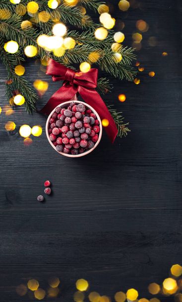 Cup of frozen cranberries as Christmas bauble - Foto, Bild