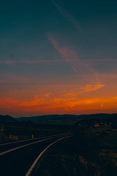 Dark sunset in the mountains - Фото, зображення