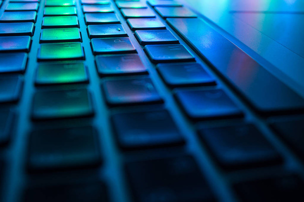 Computer keyboard close up with colorful backlight soft focus - Fotografie, Obrázek