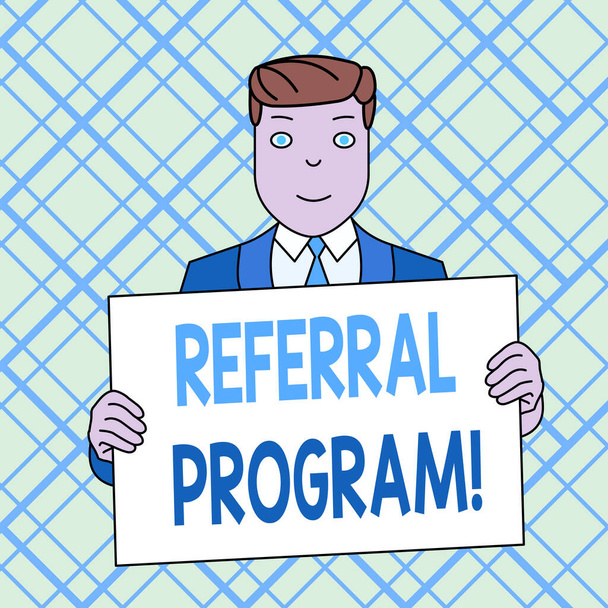 Writing note showing Referral Program. Business photo showcasing employees are rewarded for introducing suitable recruits Smiling Man Holding Suit Poster Board in Front of Himself. - 写真・画像