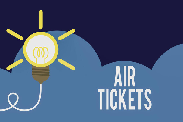 Handwriting text Air Tickets. Concept meaning individual is entitled to a seat on a flight on an aircraft Big idea light bulb. Successful turning idea invention innovation. Startup. - Photo, Image