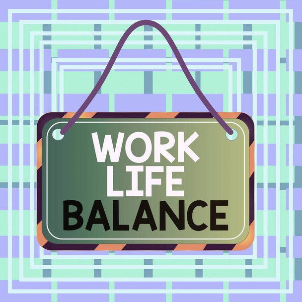 Text sign showing Work Life Balance. Conceptual photo Division of time between working or family and leisure Board attached string color black yellow frame empty blank rectangle shape. - Photo, Image
