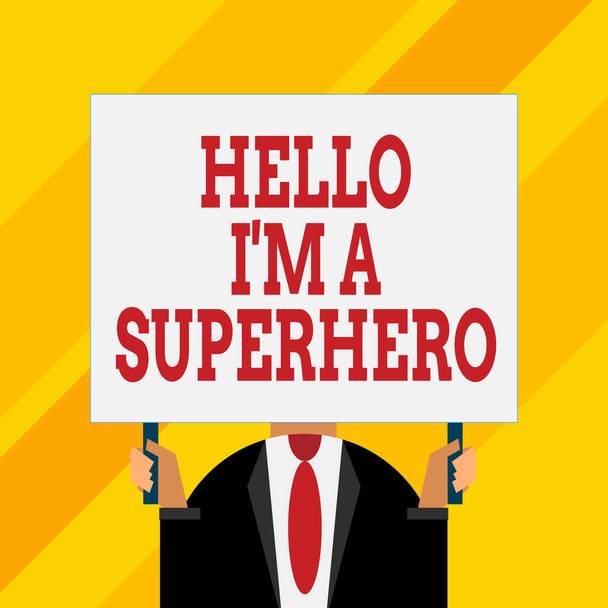 Conceptual hand writing showing Hello I M A Superhero. Business photo showcasing Believing in yourself Selfconfidence Introduction Just man chest dressed dark suit tie holding big rectangle. - Photo, Image