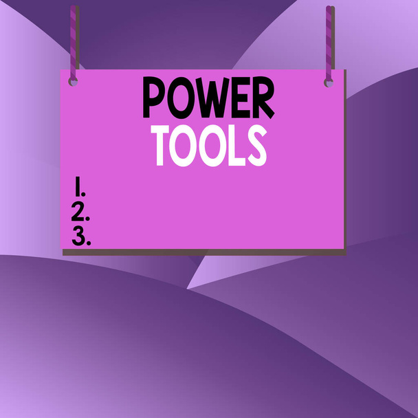 Kézírás szöveg írás Power Tools. Koncepció jelentése szerszám, amely által működtetett további energiaforrás és mechanizmus Fa tábla téglalap alakú üres keret rögzített színes csíkos húr. - Fotó, kép