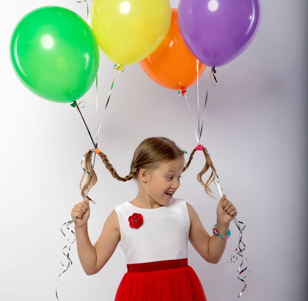 girls holding balloons in their hands, emotions - Photo, Image