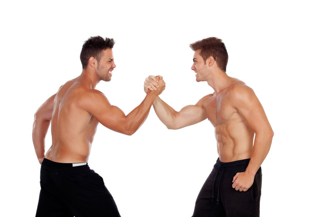 Couple of handsome muscled men competing - Foto, Bild