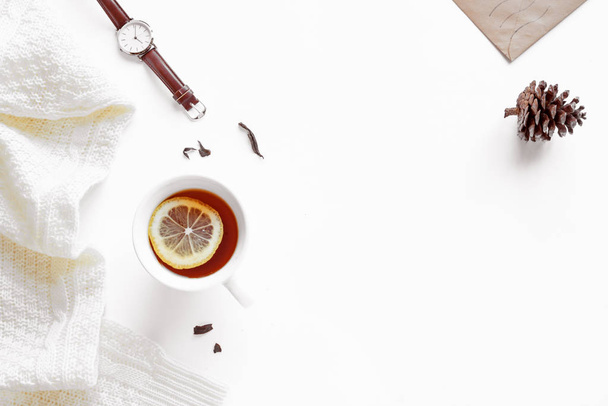 Winter flat lay with lemon tea - Foto, imagen