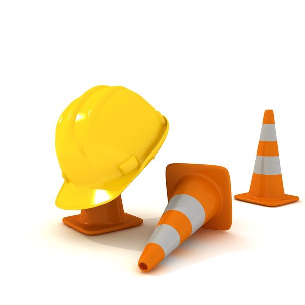Yellow helmet and road cones. - Photo, Image