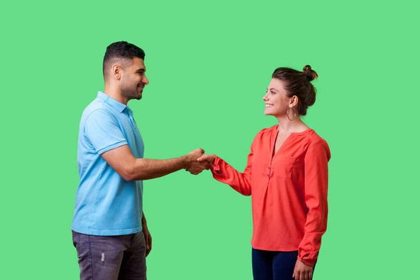 Portrait of positive friendly man and woman in casual wear shaki - Foto, afbeelding
