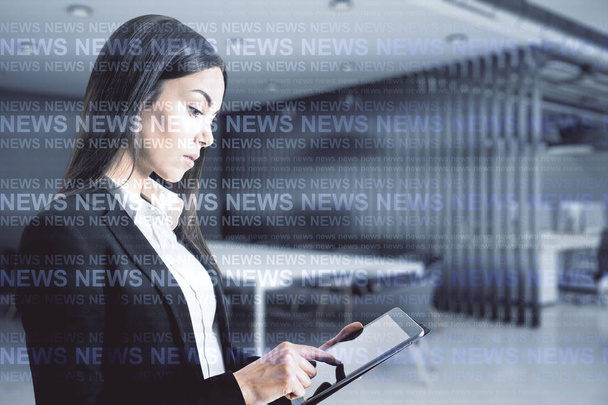 Businesswoman with device and news - Photo, Image