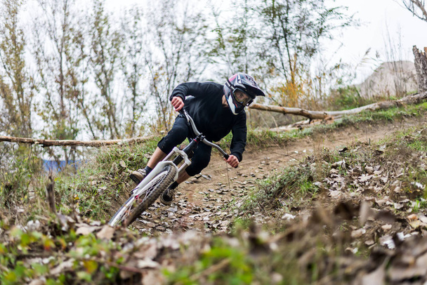 Extreme cycling concept: mountain bike racer. - 写真・画像