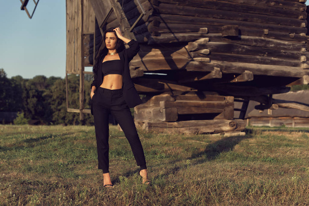 Photoshoot with a brunette in an old village - Zdjęcie, obraz