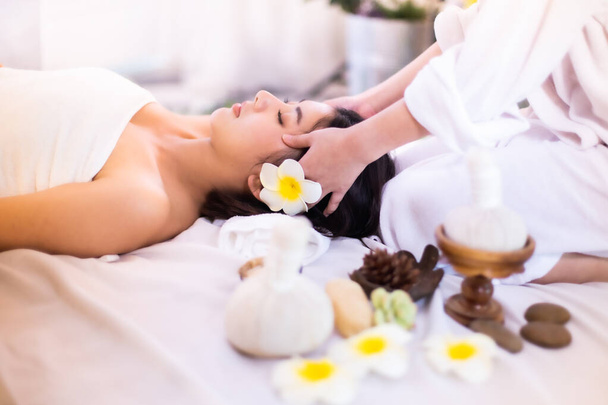 Asian Beautiful, young and healthy woman in spa salon. Massage t - Φωτογραφία, εικόνα