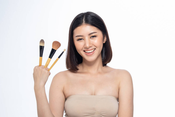 Beautiful Young Asian Woman short hair  with Clean Fresh Skin. F - Zdjęcie, obraz