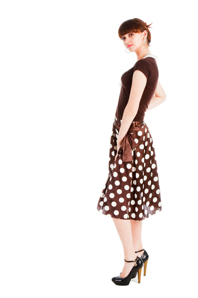 Young sensuality girl in spotted skirt - Photo, Image
