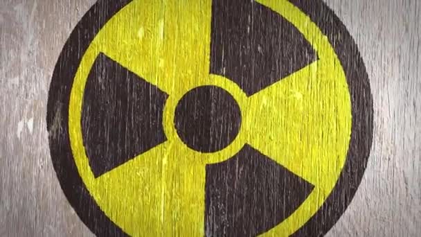 Radioaktív / radioaktivitás figyelmeztető szimbólum Wodden textúra. Ideális az Ön radioaktivitásával kapcsolatos projektekhez. Kiváló minőségű zökkenőmentes animáció. 4k, 60fps. - Felvétel, videó