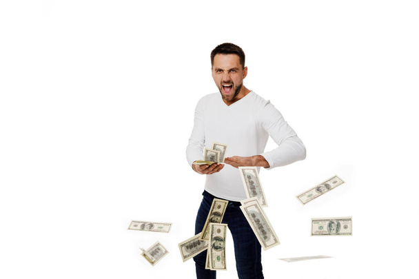 Человек выбрасывает деньги банкноты - Фото, изображение