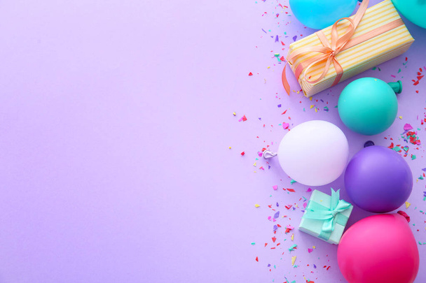 Composition with balloons, gifts and place for text on color background - Photo, Image