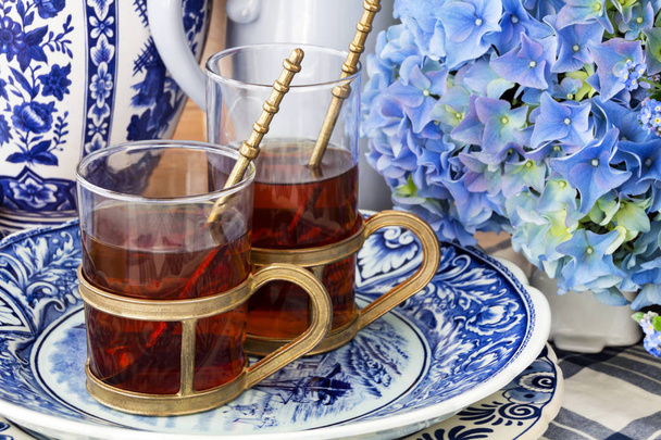 Té y decoración como fondo
 - Foto, imagen