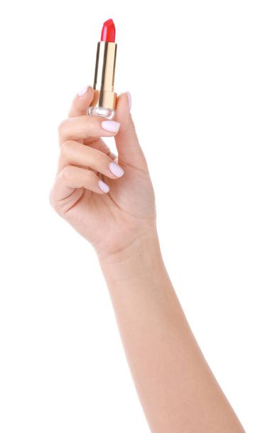 Naisten käsi huulipunalla valkoisella taustalla
 - Valokuva, kuva