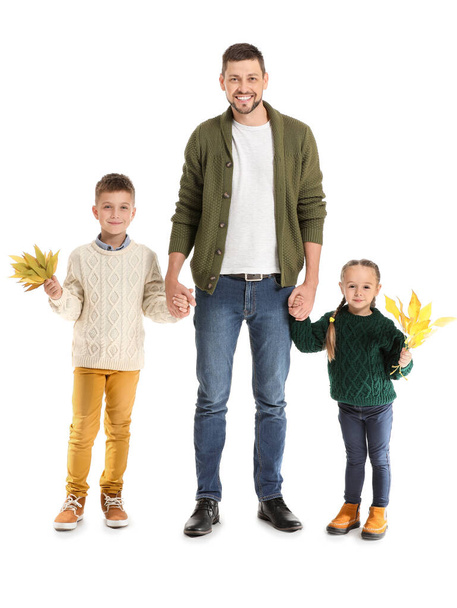 Portrait of happy family with autumn leaves on white background - Foto, immagini