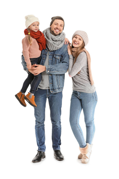 Portrait of happy family in autumn clothes on white background - Photo, Image