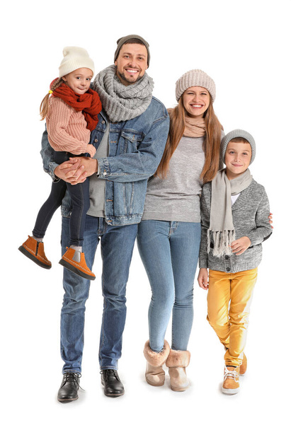 Portrait of happy family in autumn clothes on white background - Photo, Image