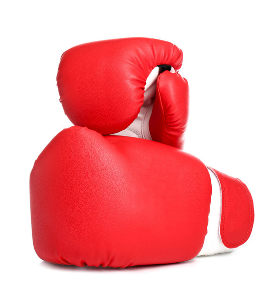 Пара боксерських рукавичок на білому тлі
 - Фото, зображення