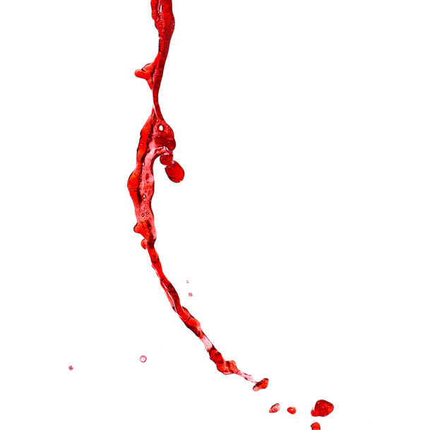 Splashing red wine on white background - Foto, Bild